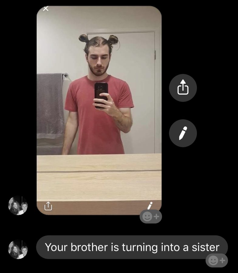 Jye with his hair in two buns